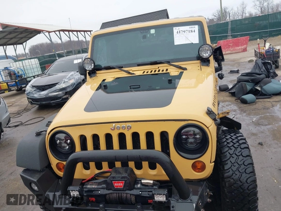 2013 Jeep Wrangler Rubicon 10th Anniversary with VIN 1C4BJWCG5DL688504, listed as a IAAI auction lot 41797184 with 109,414 mi miles and . Bid and sale history available at DreamBid. Image 12.