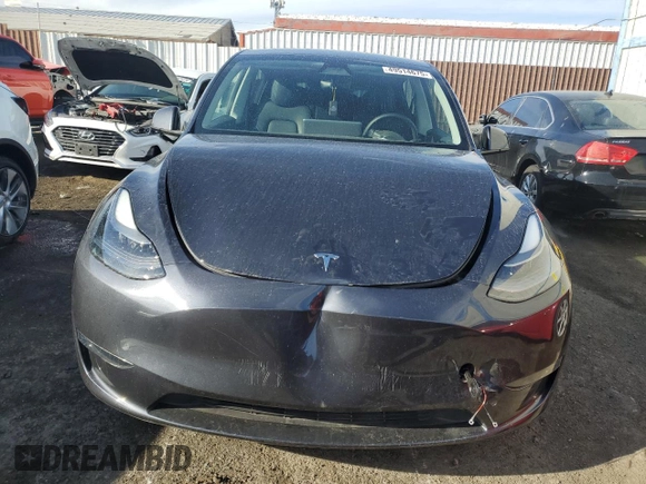 2024 Tesla Model Y Long Range with VIN 7SAYGDEE2RA252101, listed as a Copart auction lot 49514675 with 19,399 mi miles and Salvage Title. Bid and sale history available at DreamBid. Image 5.