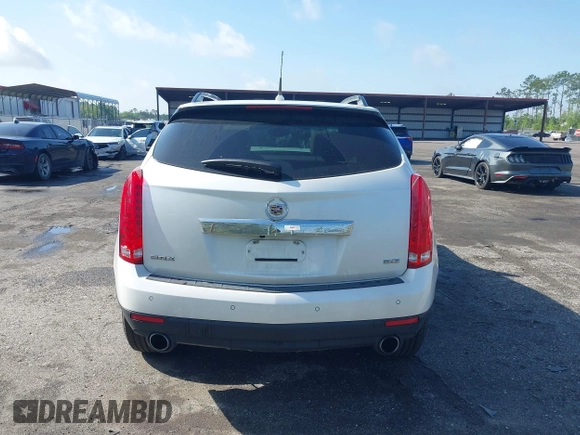 2013 Cadillac SRX Luxury Collection with VIN 3GYFNCE33DS608040, listed as a IAAI auction lot 41912860 with 128,295 mi miles and . Bid and sale history available at DreamBid. Image 16.