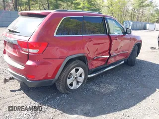 2011 Jeep Grand Cherokee Laredo with VIN 1J4RR4GG5BC512095, listed as a IAAI auction lot 42156490 with 160,749 mi miles. Bid and sale history available at carsss.com. Image 4.