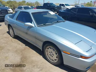 1989 Toyota Supra z VIN JT2MA71J7K0107654, wystawiony jako IAAI lot #42078617 z przebiegiem 181 176 mil mil oraz . Historia ofert i sprzedaży dostępna na DreamBid. Obrazek 6.