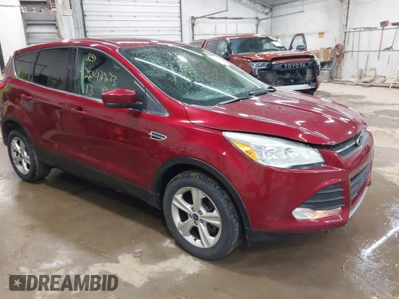 2013 Ford Escape SE with VIN 1FMCU9GX1DUC56361, listed as a IAAI auction lot 42042233 with 136,441 mi miles and . Bid and sale history available at DreamBid. Image 1.