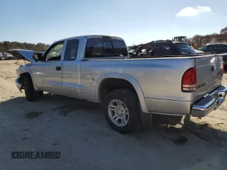2003 Dodge Dakota SLT with VIN 1D7HL42N53S266476, listed as a Copart auction lot 79446004 with 139,911 mi miles and Salvage Title. Bid and sale history available at carsss.com. Image 2.