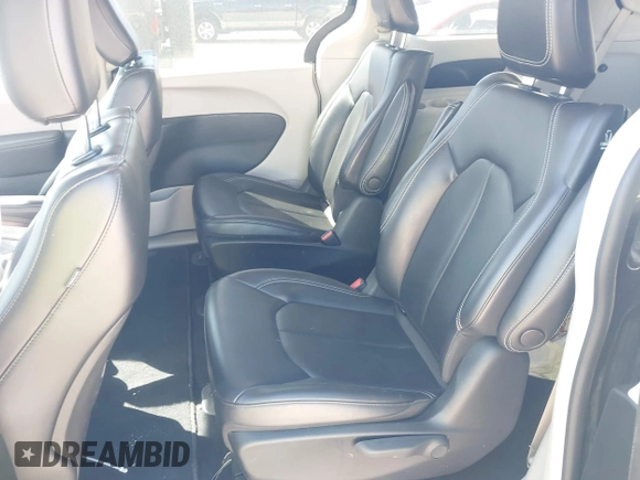 2023 Chrysler Pacifica Hybrid Touring L with VIN 2C4RC1L75PR611901, listed as a IAAI auction lot 41510935 with 44,156 mi miles and . Bid and sale history available at DreamBid. Image 8.