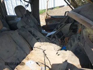 2003 Chevrolet Suburban LT z VIN 3GNEC16Z23G120835, wystawiony jako IAAI lot #41885363 z przebiegiem Nie podano mil oraz . Historia ofert i sprzedaży dostępna na DreamBid. Obrazek 5.