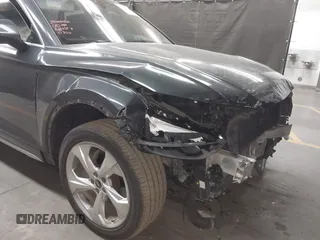 2021 Audi Q5 Premium Plus z VIN WA1BAAFY6M2130300, wystawiony jako IAAI lot #42250661 z przebiegiem 49 147 mil mil oraz . Historia ofert i sprzedaży dostępna na DreamBid. Obrazek 6.
