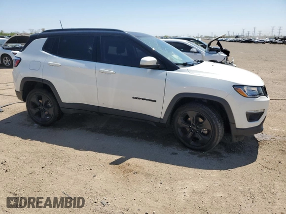2019 Jeep Compass Latitude with VIN 3C4NJDBB6KT828486, listed as a Copart auction lot 56137755 with 47,119 mi miles and Salvage title. Bid and sale history available at DreamBid. Image 4.