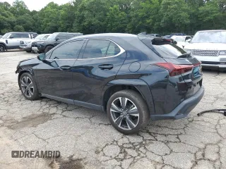 2023 Lexus UX 250h Premium с VIN JTHP6JBH8P2133821, выставлен на аукционе Copart как лот 61007355 с пробегом 32 540 миль миль и Списание • Salvage title. История ставок и продаж доступна на DreamBid. Изображение 2.