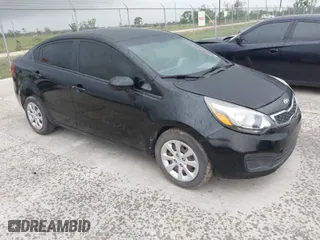 2015 Kia Rio LX with VIN KNADM4A3XF6453521, listed as a IAAI auction lot 42084653 with 94,724 mi miles. Bid and sale history available at carsss.com. Image 1.