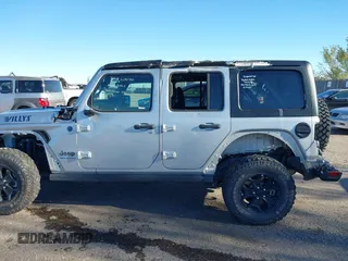 2023 Jeep Wrangler z VIN 1C4JJXN62PW628429, wystawiony jako IAAI lot #40861135 z przebiegiem 33 923 mil mil oraz . Historia ofert i sprzedaży dostępna na DreamBid. Obrazek 14.