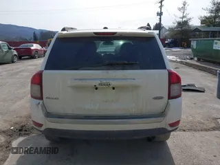 2015 Jeep Compass High Altitude Edition with VIN 1C4NJDEB9FD396239, listed as a IAAI auction lot 41451090 with 86,826 mi miles. Bid and sale history available at carsss.com. Image 16.
