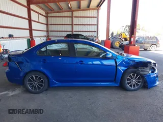 2017 Mitsubishi Lancer ES with VIN JA32V2FW5HU004856, listed as a IAAI auction lot 41950912 with 74,890 mi miles. Bid and sale history available at carsss.com. Image 13.