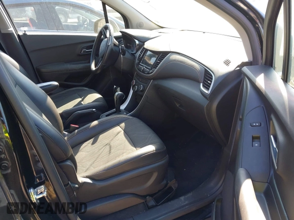 2019 Chevrolet Trax LT z VIN KL7CJLSB1KB774921, wystawiony jako IAAI lot #41590380 z przebiegiem 56 377 mil mil oraz . Historia ofert i sprzedaży dostępna na DreamBid. Obrazek 5.