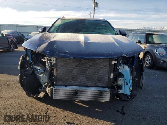 2022 Buick Envision Essence with VIN LRBFZPR47ND067434, listed as a Copart auction lot 82749104 with 13,935 mi miles and Salvage Title. Bid and sale history available at carsss.com. Image 5.