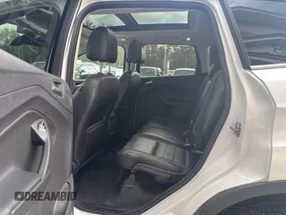 2014 Ford Escape Titanium with VIN 1FMCU9J94EUC63638, listed as a IAAI auction lot 42196241 with 198,112 mi miles and . Bid and sale history available at DreamBid. Image 8.