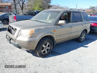 2008 Honda Pilot EX-L with VIN 5FNYF18778B052859, listed as a IAAI auction lot 41695095 with 249,207 mi miles and . Bid and sale history available at DreamBid. Image 2.