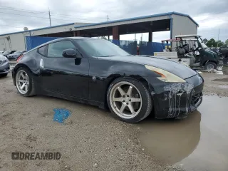 2009 Nissan 370Z Touring with VIN JN1AZ44E29M406023, listed as a Copart auction lot 73721324 with 108,072 mi miles and Salvage Title. Bid and sale history available at carsss.com. Image 4.