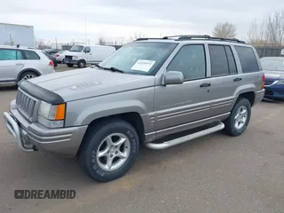 1998 Jeep Grand Cherokee Limited with VIN 1J4GZ88Z6WC307986, listed as a IAAI auction lot 41539972 with 150,652 mi miles. Bid and sale history available at carsss.com. Image 2.
