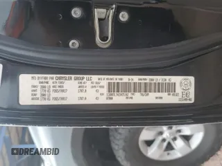 2014 Ram 1500 Big Horn z VIN 1C6RR7LT4ES475102, wystawiony jako Copart lot #58693015 z przebiegiem 128 829 mil mil oraz Szkoda całkowita • Salvage title. Historia ofert i sprzedaży dostępna na DreamBid. Obrazek 12.
