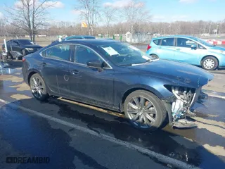 2018 Mazda Mazda6 Touring with VIN JM1GL1VM4J1318433, listed as a IAAI auction lot 41552864 with 72,146 mi miles. Bid and sale history available at carsss.com. Image 1.