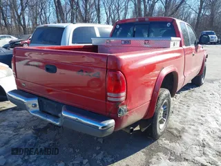 1999 Dodge Dakota SLT with VIN 1B7GG22Y3XS289253, listed as a IAAI auction lot 41283728 with 154,038 mi miles and . Bid and sale history available at carsss.com. Image 4.