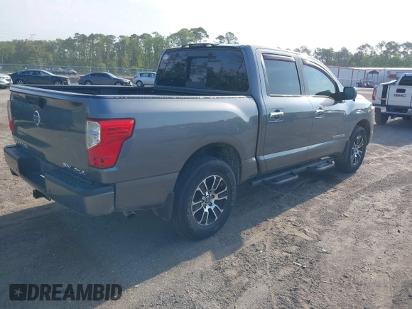 2021 Nissan Titan Pro-4X with VIN 1N6AA1ED0MN518084, listed as a IAAI auction lot 42147230 with 41,496 mi miles and . Bid and sale history available at DreamBid. Image 4.