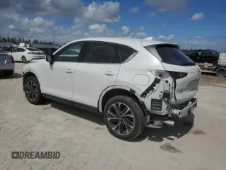 2023 Mazda CX-5 S Premium with VIN JM3KFBDM6P0146078, listed as a Copart auction lot 55654665 with 13,645 mi miles and Salvage Title. Bid and sale history available at DreamBid. Image 2.