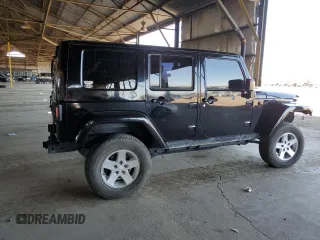 2008 Jeep Wrangler Unlimited Sahara with VIN 1J4GA59108L521910, listed as a Copart auction lot 62330425 with 169,887 mi miles and Salvage title. Bid and sale history available at DreamBid. Image 3.