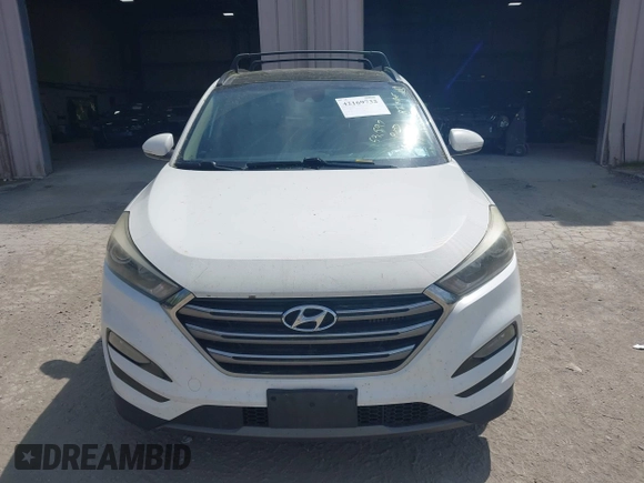 2016 Hyundai Tucson Eco with VIN KM8J3CA22GU076489, listed as a IAAI auction lot 42169732 with 153,597 mi miles. Bid and sale history available at carsss.com. Image 12.