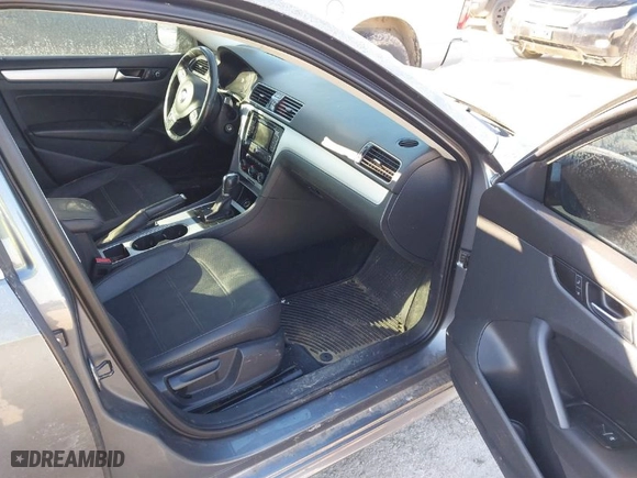 2013 Volkswagen Passat TDI SE w/Sunroof with VIN 1VWBN7A35DC136332, listed as a IAAI auction lot 41639915 with 119,310 mi miles. Bid and sale history available at carsss.com. Image 5.