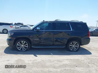 2015 Chevrolet Tahoe LTZ with VIN 1GNSCCKC4FR309152, listed as a IAAI auction lot 42029341 with 187,313 mi miles and . Bid and sale history available at DreamBid. Image 6.