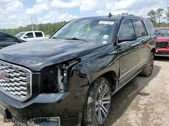 2019 GMC Yukon Denali with VIN 1GKS1CKJ0KR259491, listed as a Copart auction lot 51071335 with 105,294 mi miles and Salvage Title. Bid and sale history available at carsss.com. Image 12.