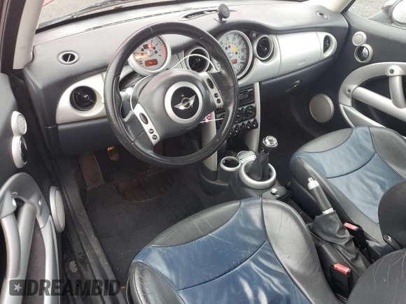 2003 MINI Hardtop z VIN WMWRC33413TC45360, wystawiony jako Copart lot #82666434 z przebiegiem 123 226 mil mil oraz Szkoda całkowita • Salvage title. Historia ofert i sprzedaży dostępna na DreamBid. Obrazek 8.
