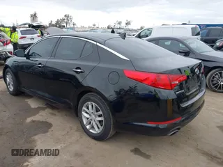 2012 Kia Optima LX with VIN KNAGM4A72C5291451, listed as a IAAI auction lot 42068559 with 121,548 mi miles and . Bid and sale history available at carsss.com. Image 3.