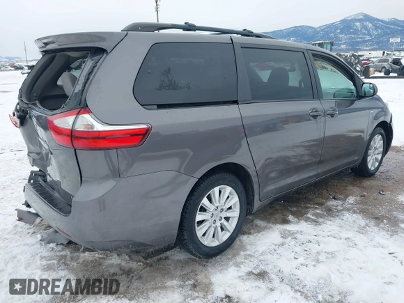 2016 Toyota Sienna LE with VIN 5TDJK3DC6GS142669, listed as a IAAI auction lot 41436771 with 135,715 mi miles. Bid and sale history available at carsss.com. Image 4.
