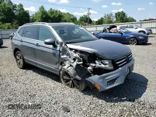 2018 Volkswagen Tiguan SEL z VIN 3VV2B7AX5JM065899, wystawiony jako Copart lot #65825635 z przebiegiem 115 677 mil mil oraz Szkoda całkowita • Salvage title. Historia ofert i sprzedaży dostępna na DreamBid. Obrazek 14.