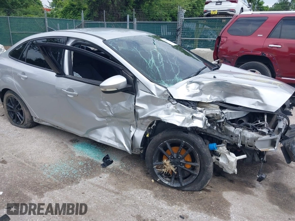 2016 Ford Focus SE z VIN 1FADP3F22GL373756, wystawiony jako IAAI lot #42369795 z przebiegiem 99 646 mil mil oraz . Historia ofert i sprzedaży dostępna na DreamBid. Obrazek 14.