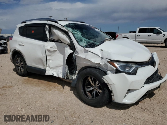 2018 Toyota RAV4 XLE with VIN JTMWFREV9JJ187834, listed as a Copart auction lot 56125505 with Not provided miles and Salvage title. Bid and sale history available at DreamBid. Image 4.