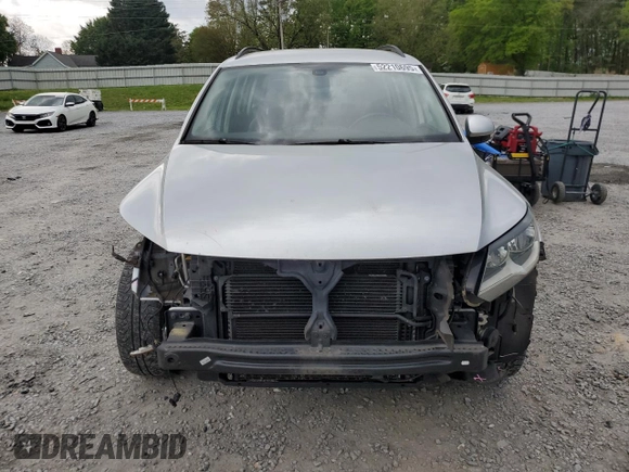 2017 Volkswagen Tiguan S with VIN WVGAV7AX9HK002092, listed as a Copart auction lot 52210695 with 113,791 mi miles and Salvage Title. Bid and sale history available at DreamBid. Image 5.