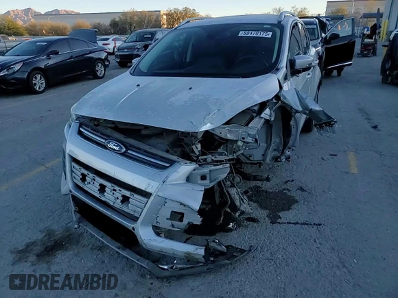 2016 Ford Escape Titanium with VIN 1FMCU9J95GUA69932, listed as a Copart auction lot 88470175 with 108,471 mi miles and Salvage title. Bid and sale history available at DreamBid. Image 15.