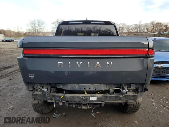2023 Rivian R1T Adventure z VIN 7FCTGBAA8PN028065, wystawiony jako Copart lot #81941474 z przebiegiem 16 060 mil mil oraz Szkoda całkowita • Salvage title. Historia ofert i sprzedaży dostępna na DreamBid. Obrazek 6.