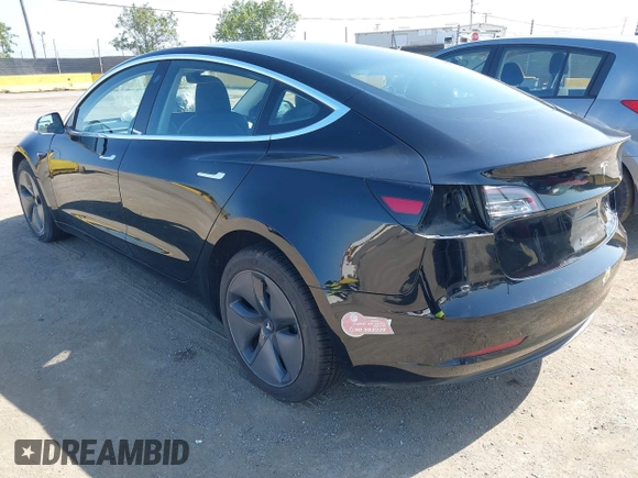 2018 Tesla Model 3 Long Range Battery with VIN 5YJ3E1EA7JF057031, listed as a IAAI auction lot 42139832 with 92,618 mi miles and . Bid and sale history available at DreamBid. Image 3.