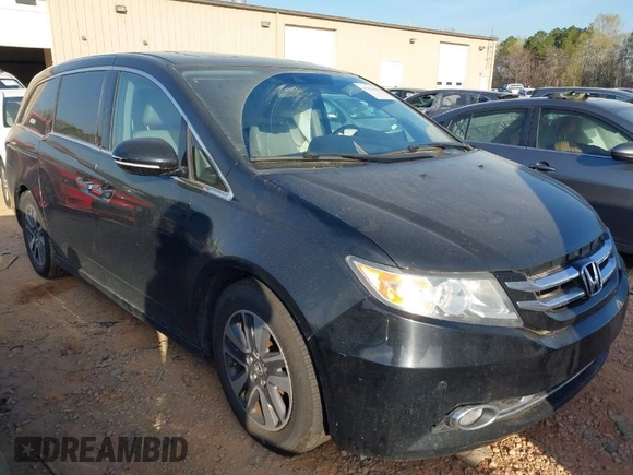 2014 Honda Odyssey Touring with VIN 5FNRL5H90EB077054, listed as a IAAI auction lot 41904456 with 197,869 mi miles and . Bid and sale history available at carsss.com. Image 1.
