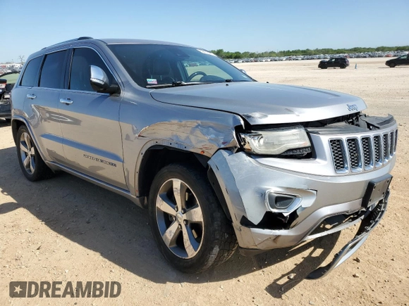 2014 Jeep Grand Cherokee Overland with VIN 1C4RJFCG7EC153156, listed as a Copart auction lot 52452925 with 152,348 mi miles and Salvage Title. Bid and sale history available at DreamBid. Image 4.