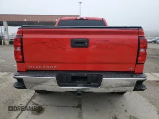 2018 Chevrolet Silverado 1500 LT with VIN 1GCVKREC5JZ325988, listed as a Copart auction lot 52478535 with 57,258 mi miles and Salvage Title. Bid and sale history available at DreamBid. Image 6.