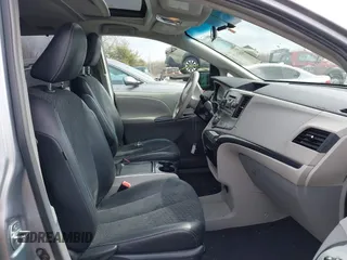 2011 Toyota Sienna SE with VIN 5TDXK3DC1BS096963, listed as a IAAI auction lot 41676328 with 168,436 mi miles. Bid and sale history available at carsss.com. Image 5.