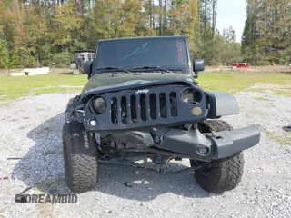 2012 Jeep Wrangler Unlimited Sport with VIN 1C4BJWDG2CL258264, listed as a IAAI auction lot 41880235 with 173,661 mi miles. Bid and sale history available at carsss.com. Image 13.