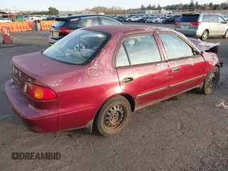 1998 Toyota Corolla VE with VIN 1NXBR12E9WZ138078, listed as a IAAI auction lot 41392232 with Not provided miles and . Bid and sale history available at DreamBid. Image 4.