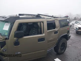 2005 Hummer H2 SUV with VIN 5GRGN23U35H130615, listed as a IAAI auction lot 41085325 with 138,393 mi miles. Bid and sale history available at carsss.com. Image 6.