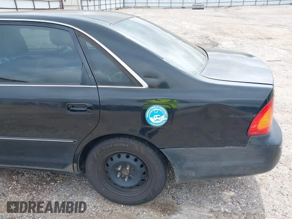 2001 Toyota Avalon XL z VIN 4T1BF28B61U191292, wystawiony jako IAAI lot #42239698 z przebiegiem 288 073 mil mil oraz . Historia ofert i sprzedaży dostępna na DreamBid. Obrazek 6.